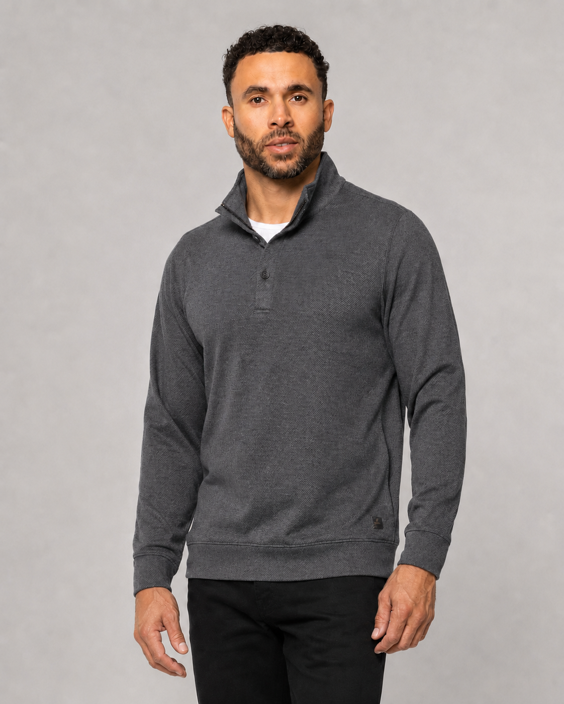 Men's dark mock-neck pullover with button placket and long sleeves