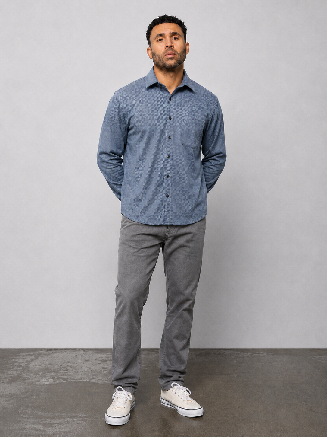 CALA indigo twill long-sleeve button-up shirt with collar and front buttons