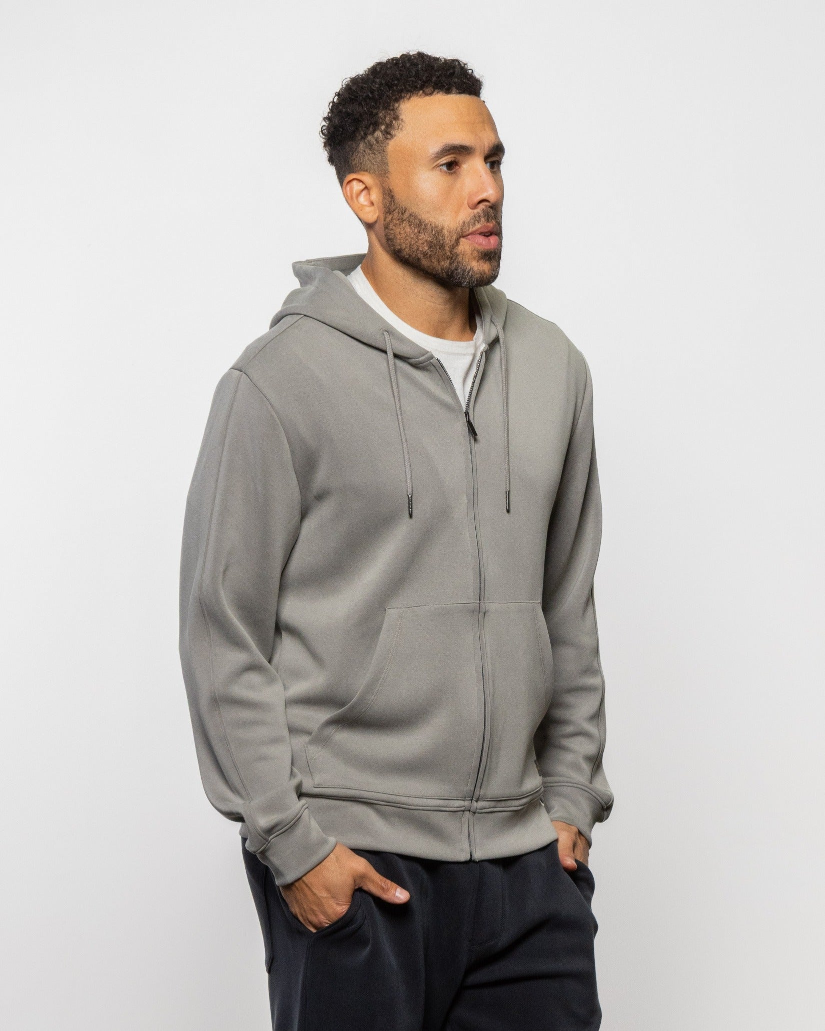 Men's full-zip hoodie with hood, drawstrings, and front zipper; concrete gray