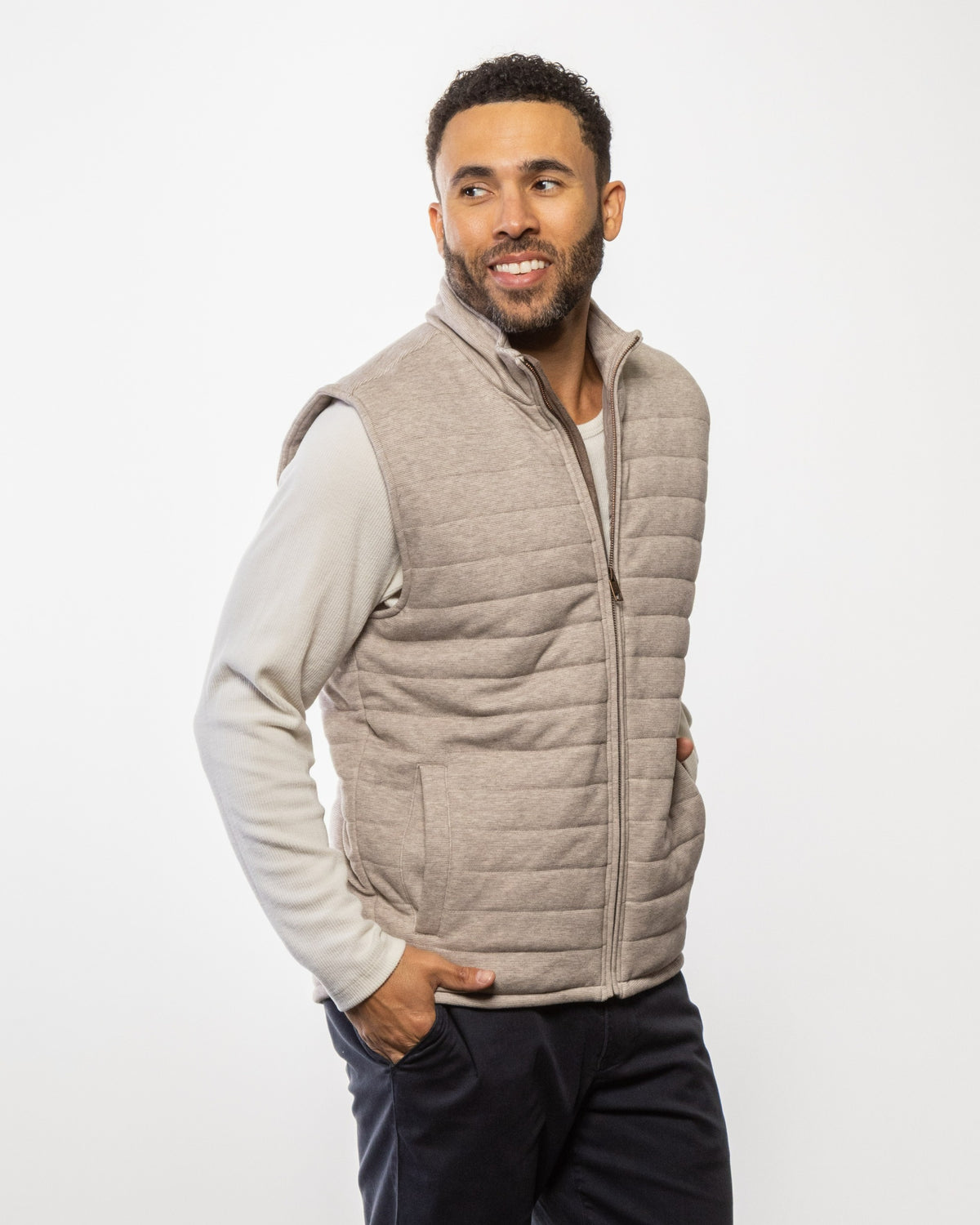 Men's quilted puffer vest in wood brown with full front zipper and stand collar