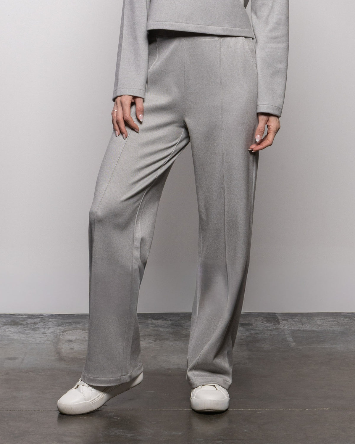 Light gray straight-leg pants, relaxed fit, side pockets