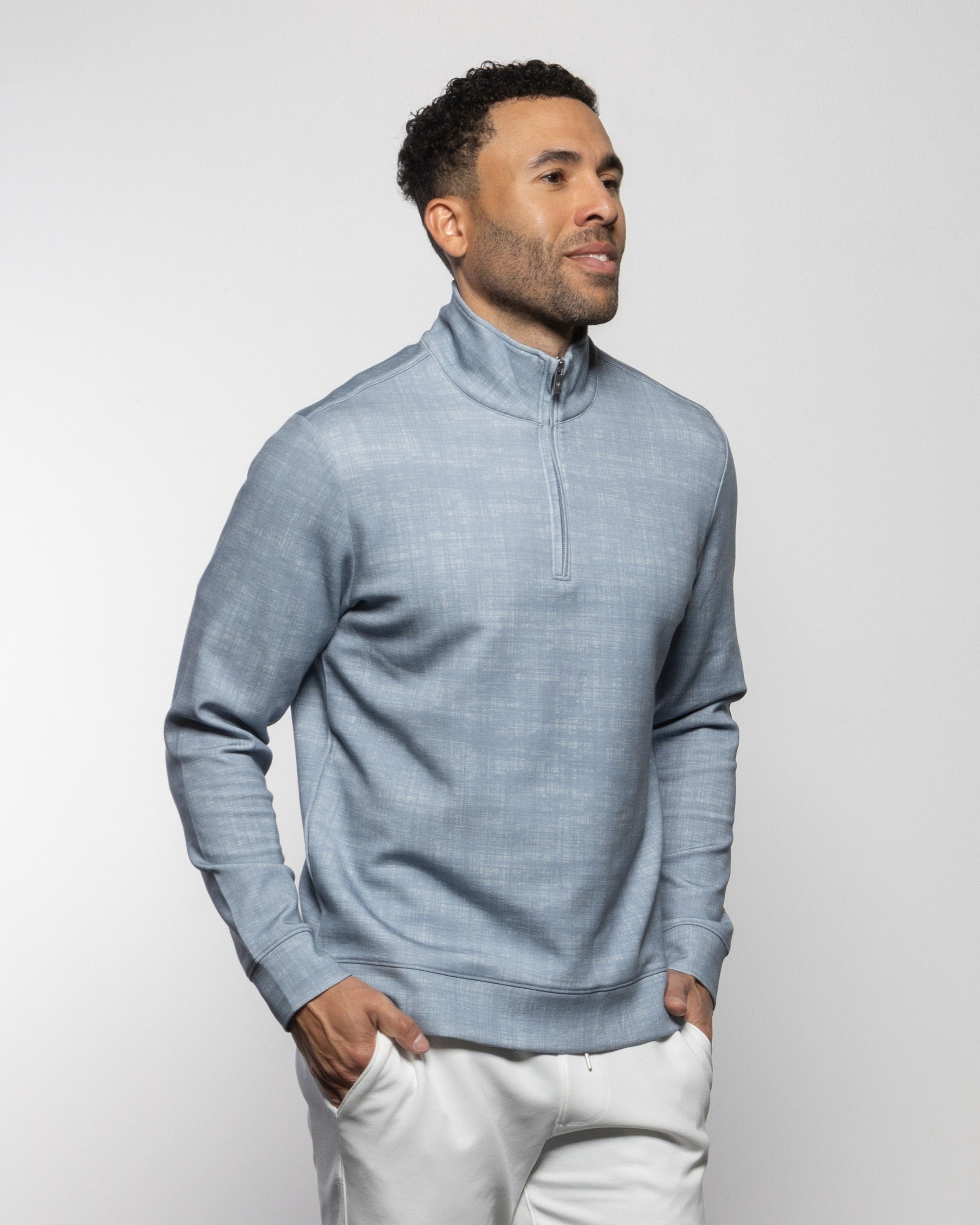 Men's light-blue quarter-zip sweater with zip-neck and long sleeves