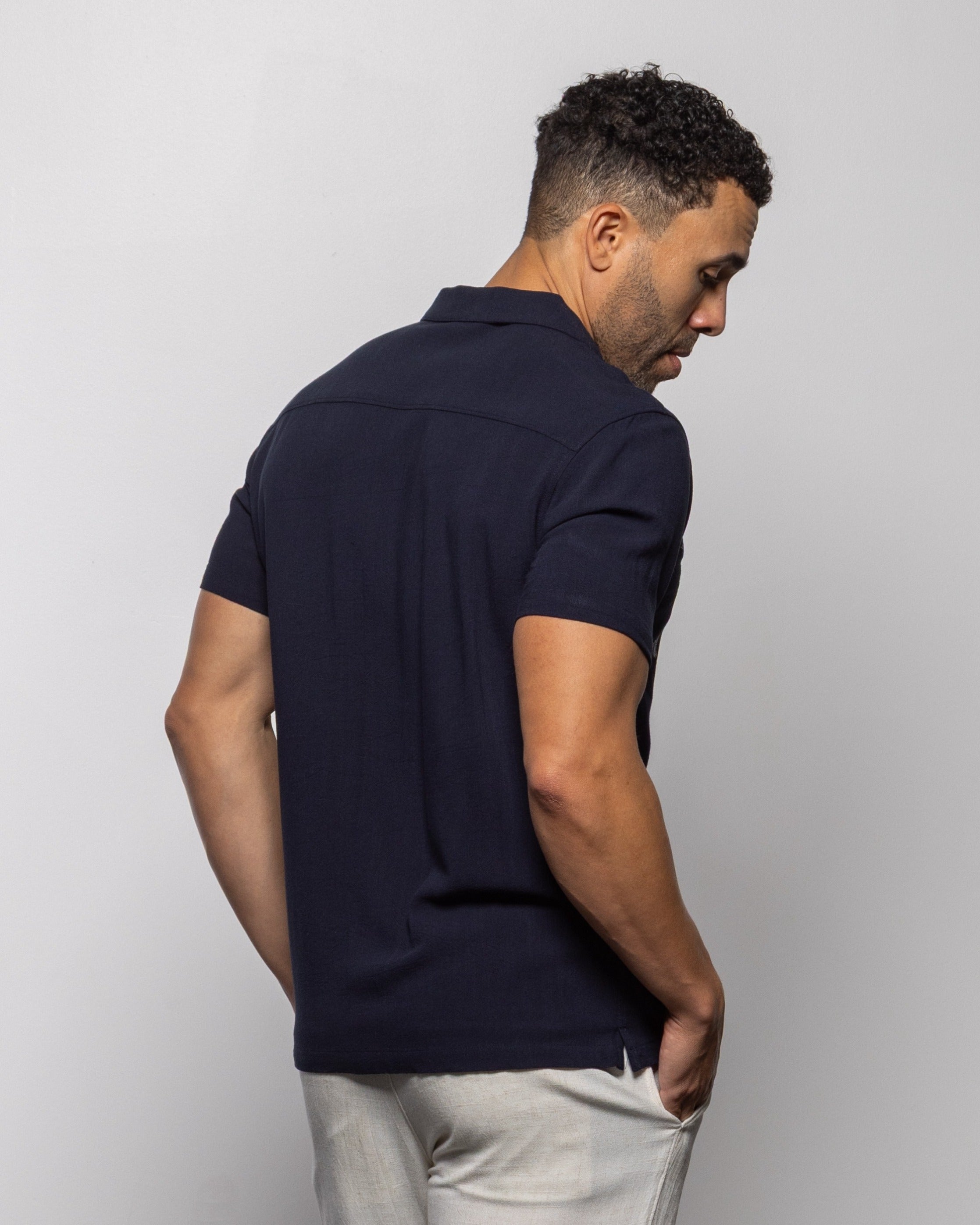 Indigo camp shirt back view, short sleeves, solid design, pointed collar