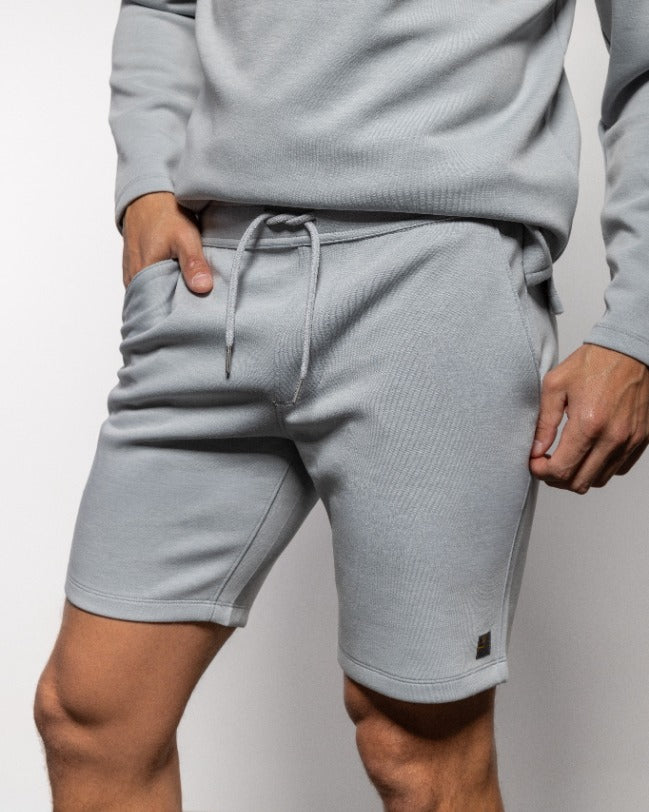 Men's concrete gray drawstring shorts with stitched seams and side pockets