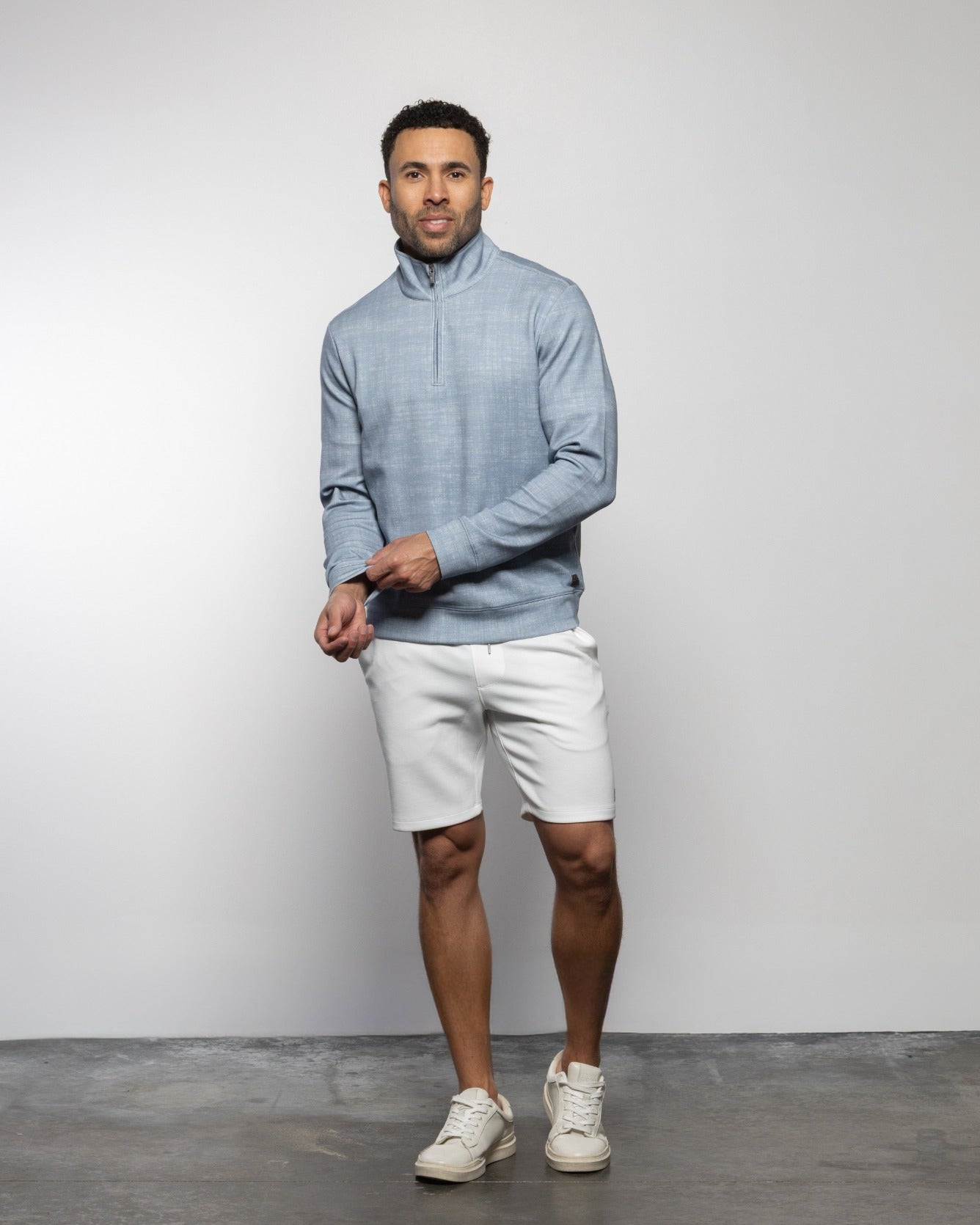 Men's white shorts with elastic drawstring waist and side pockets