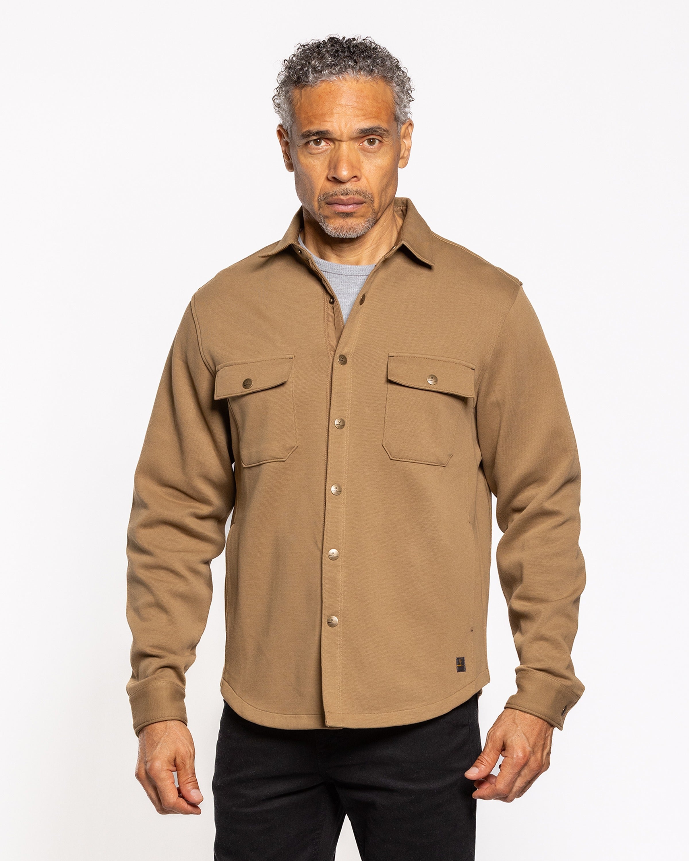 Griffin shirt jacket in tan with button placket, stand collar, two chest pockets