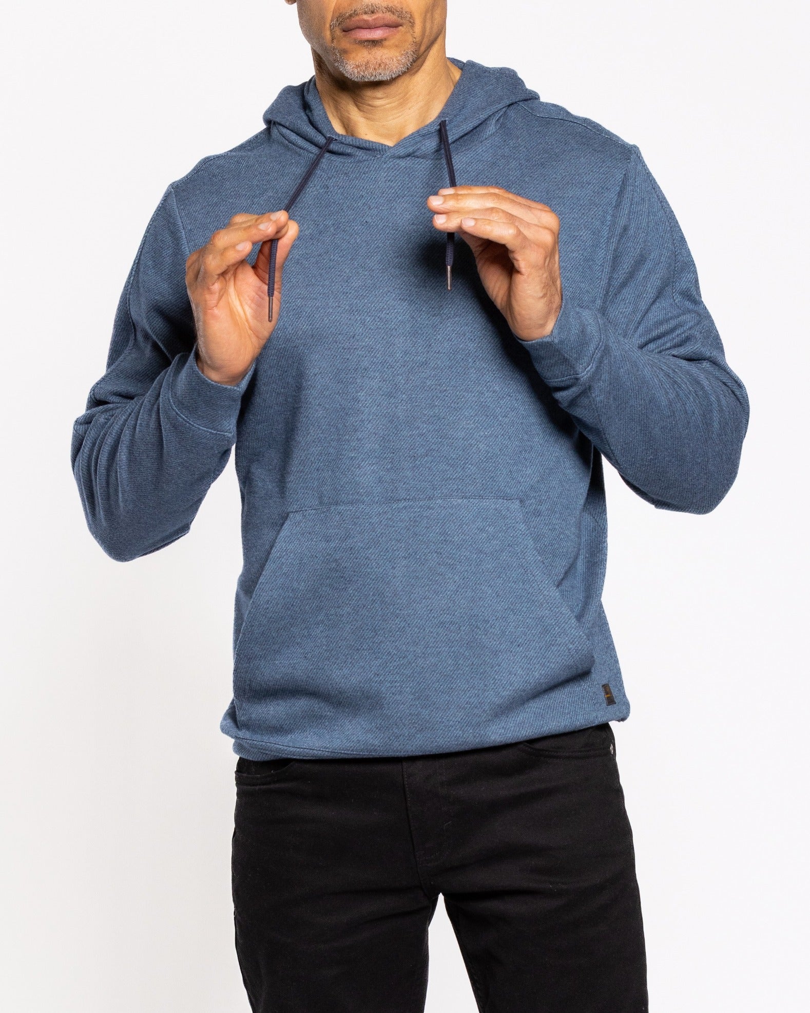 Indigo twill hood sweatshirt close-up, drawstring hood and front pouch pocket