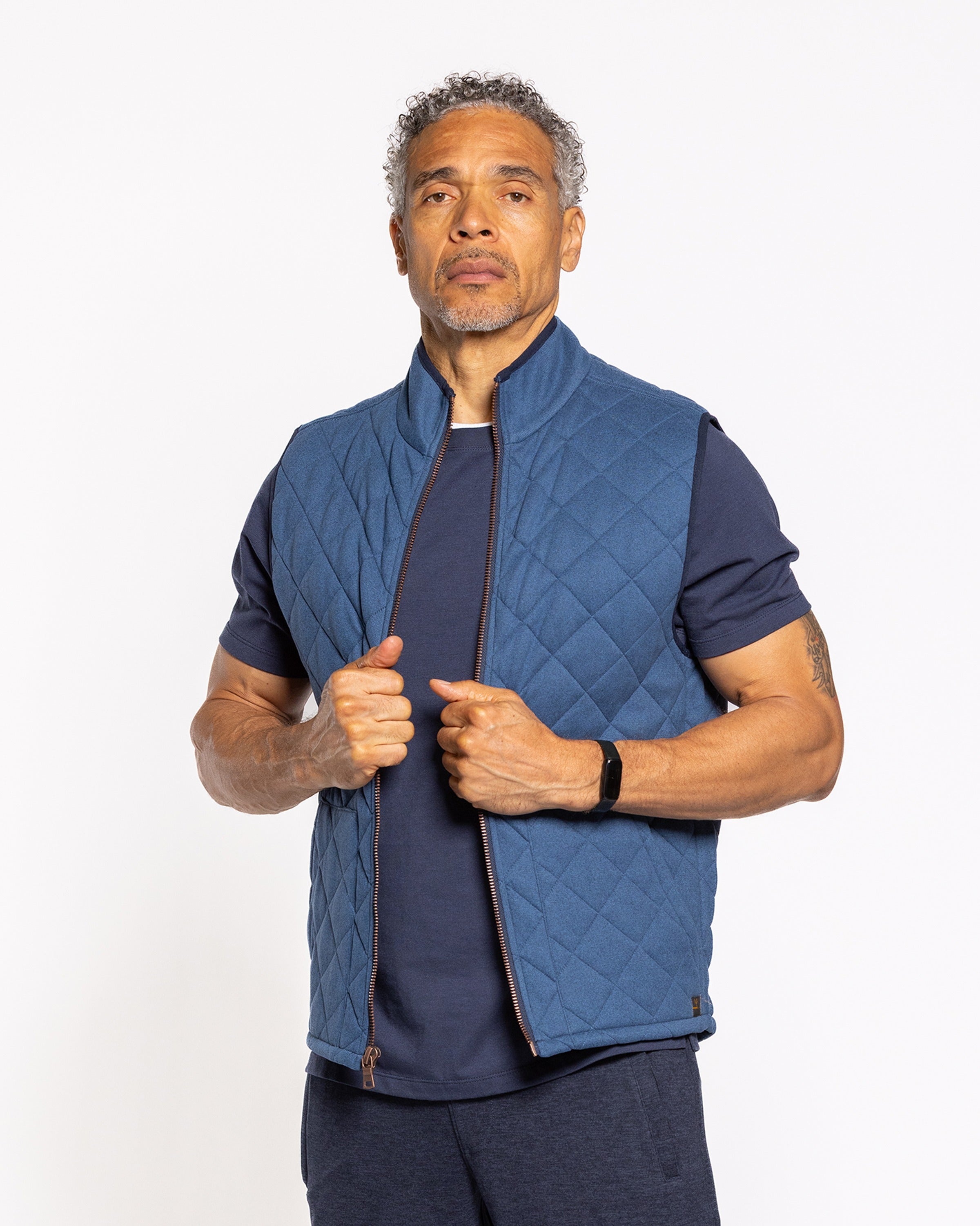 Manhattan quilted indigo night vest with full front zipper and stand collar