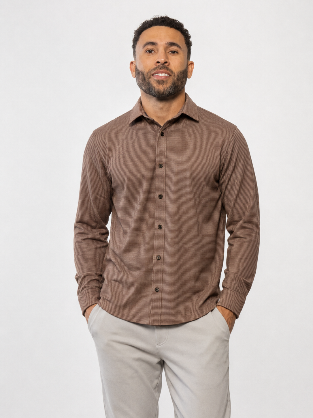 Men's long-sleeve button-up shirt in brown with button placket and collar