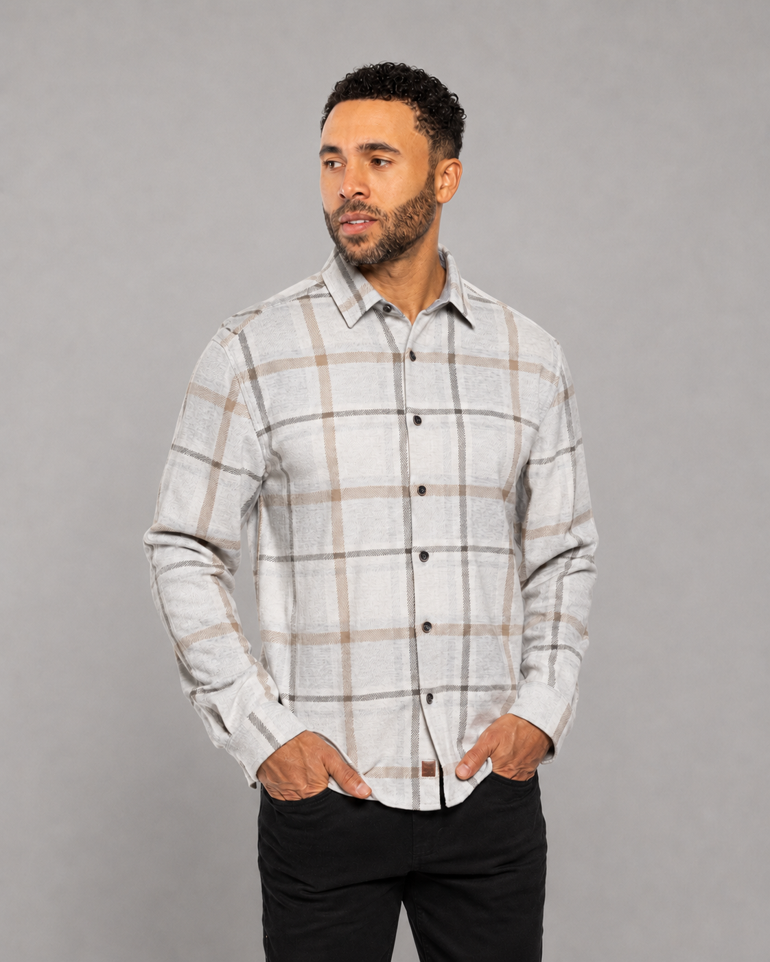 Men's white and gray plaid button-up shirt with long sleeves and button cuffs