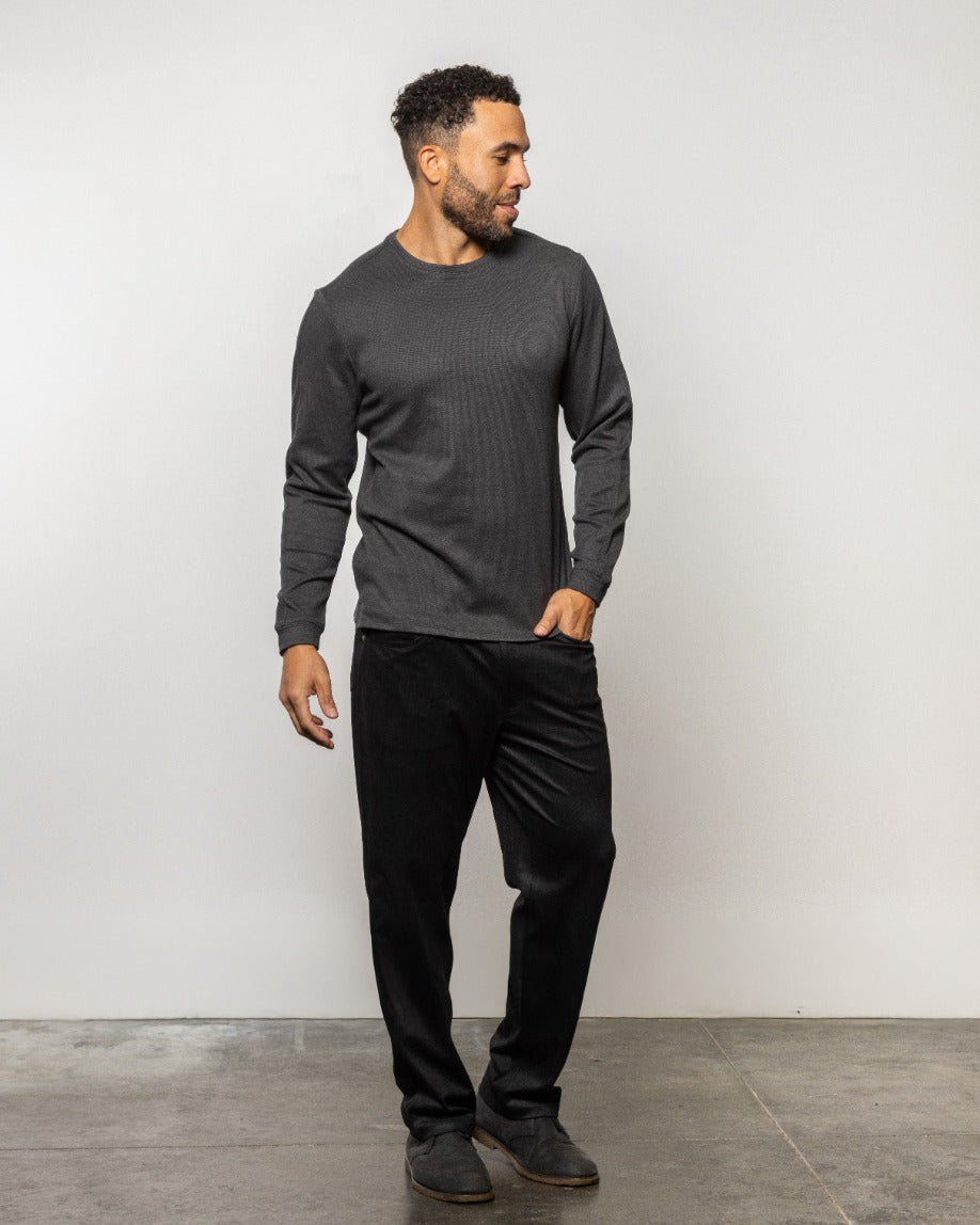 HERMOSA crewneck sweatshirt in dark charcoal, long sleeves, crew neck—side view.