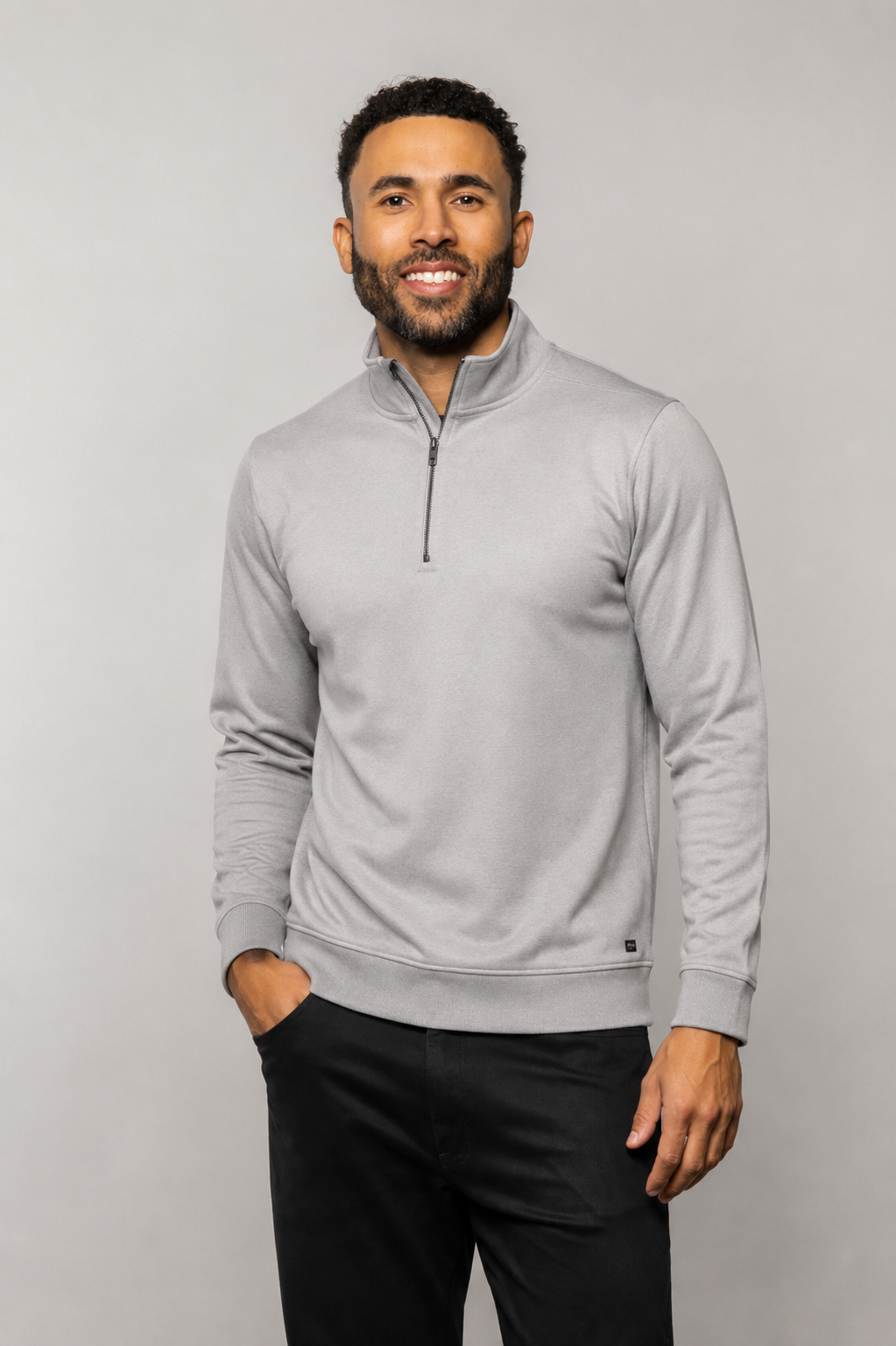 Light gray quarter-zip fleece pullover with long sleeves and front zipper