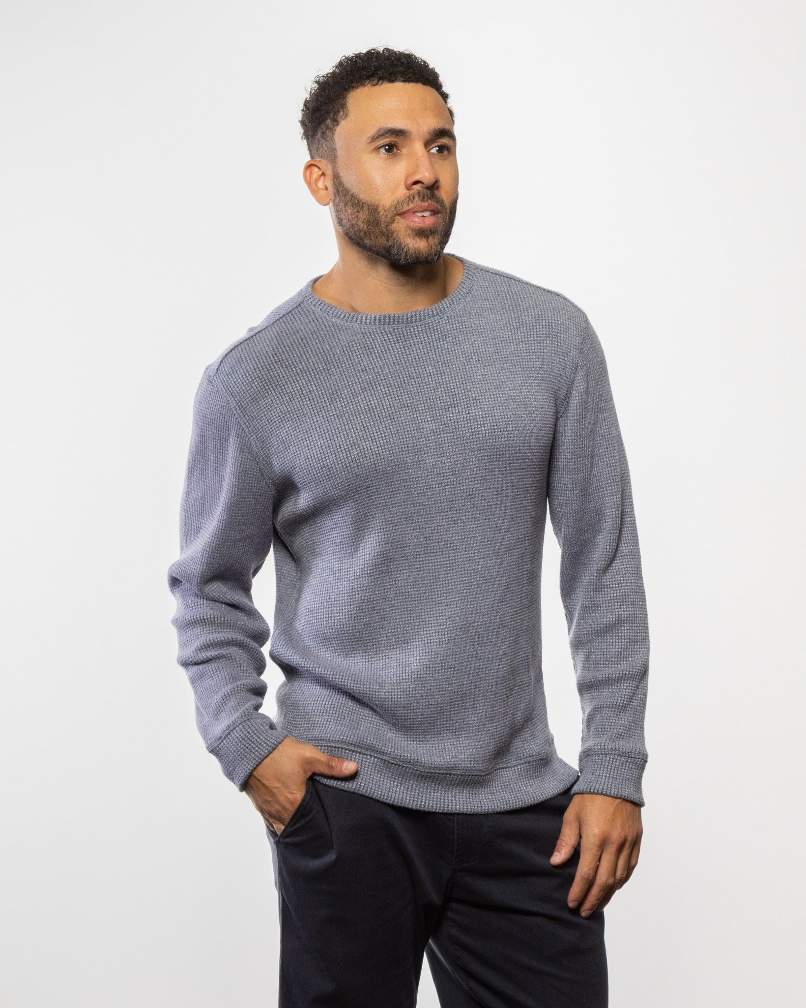 Men's heather gray crewneck knit sweater with long sleeves and ribbed cuffs