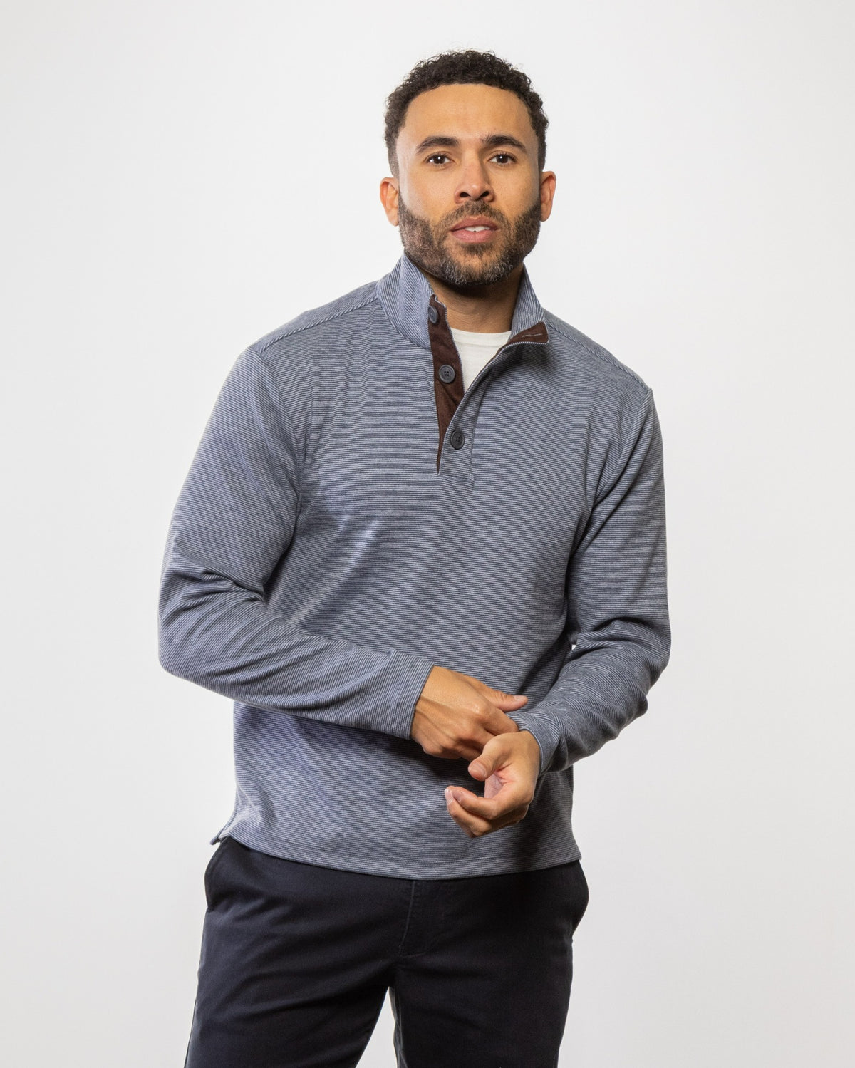 Men's button mock pullover sweater, blue-gray long sleeves, buttoned collar.