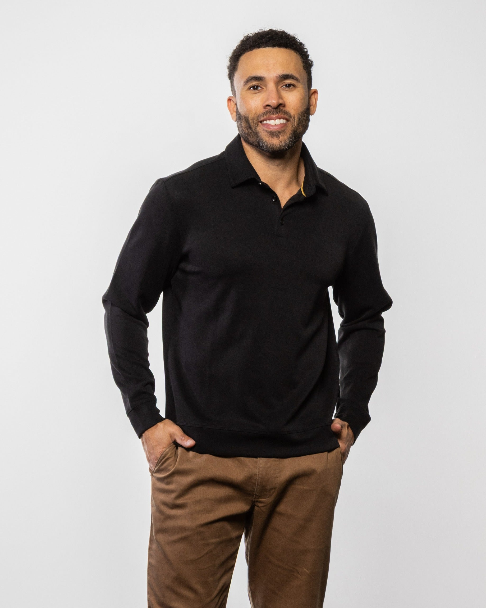 Men's matte black polo shirt with collar and button placket