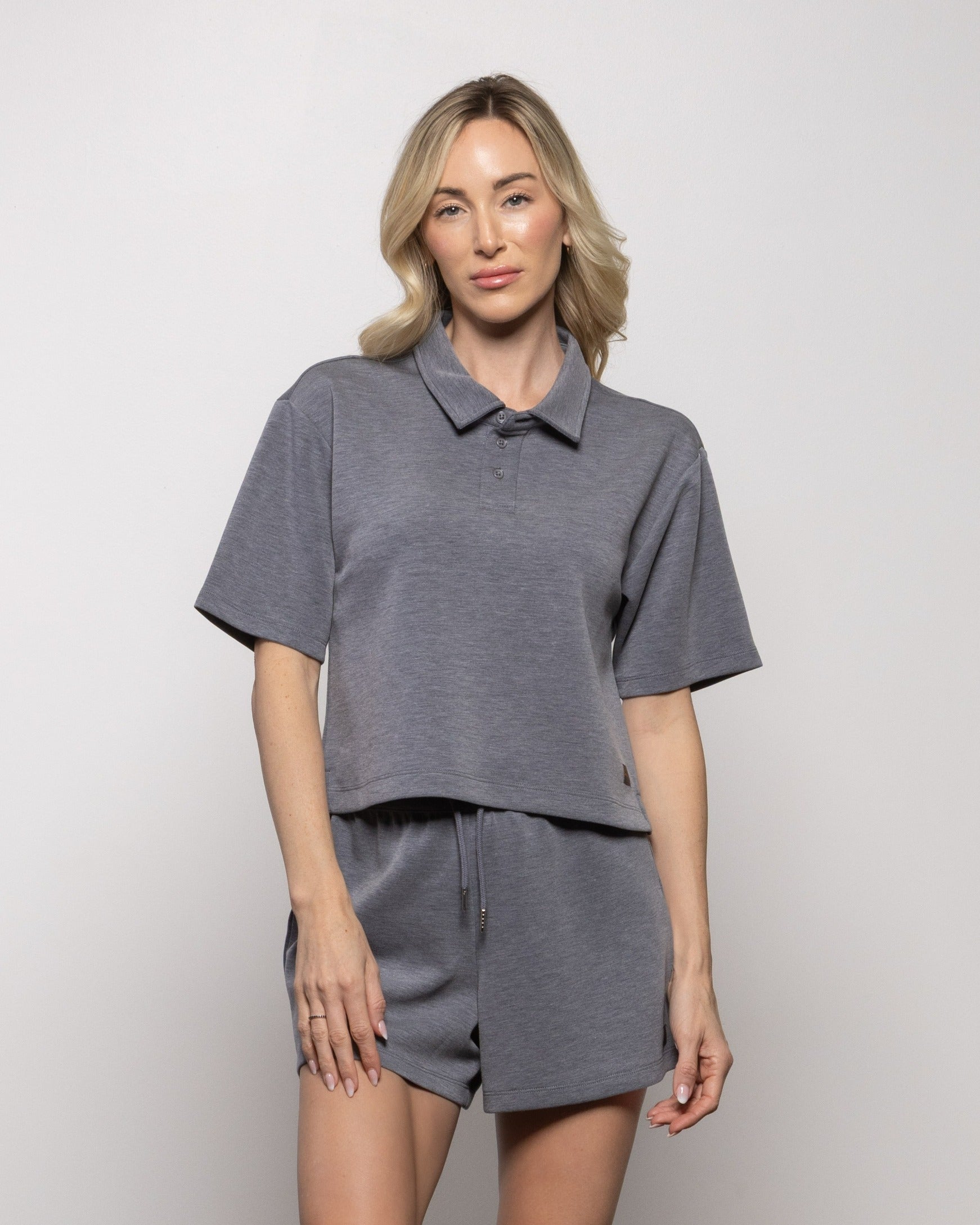 Dark heather gray polo shirt with button collar and matching shorts
