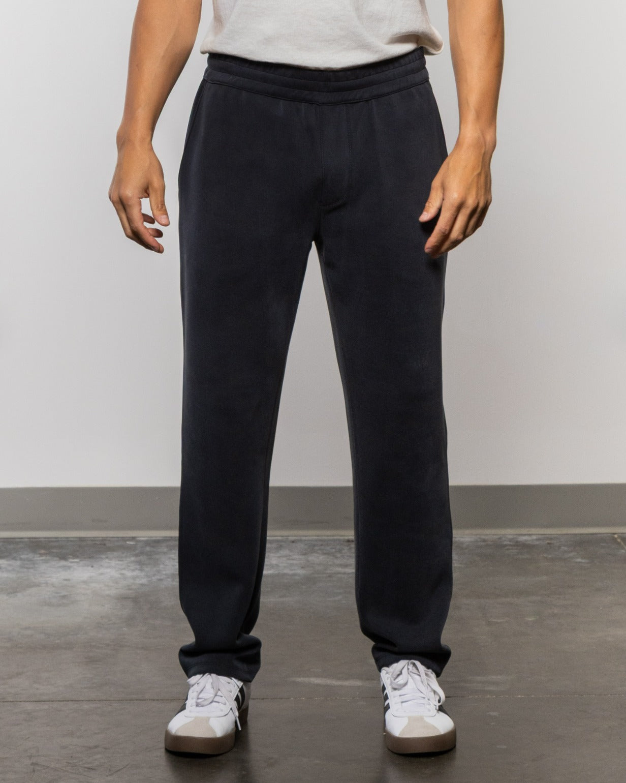 Jet black tall jogger pants with elastic waistband and tapered cuffs