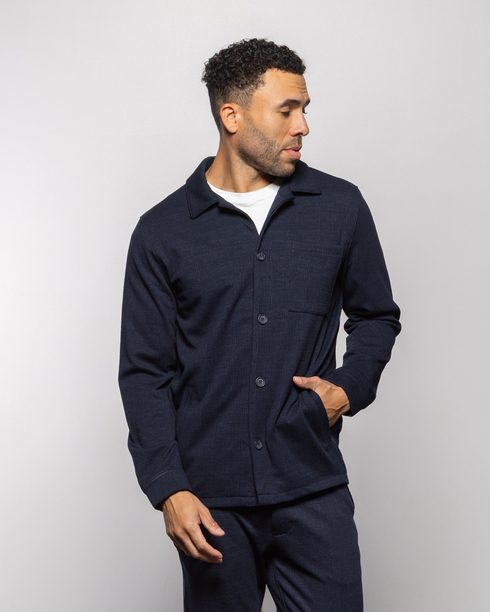 Milan indigo night jacket with button front, collared neckline, long sleeves