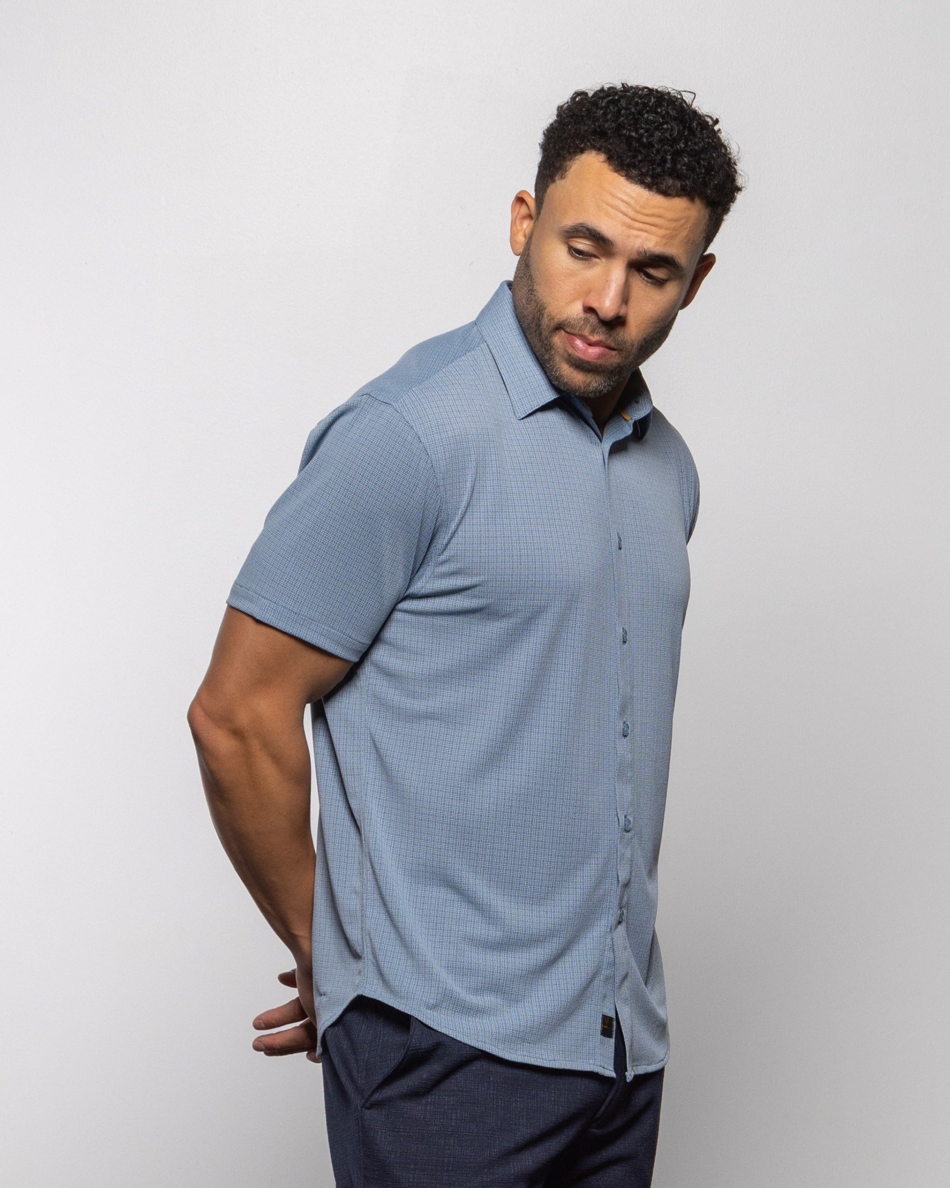 Men's dusty blue short-sleeve button-up shirt, side view