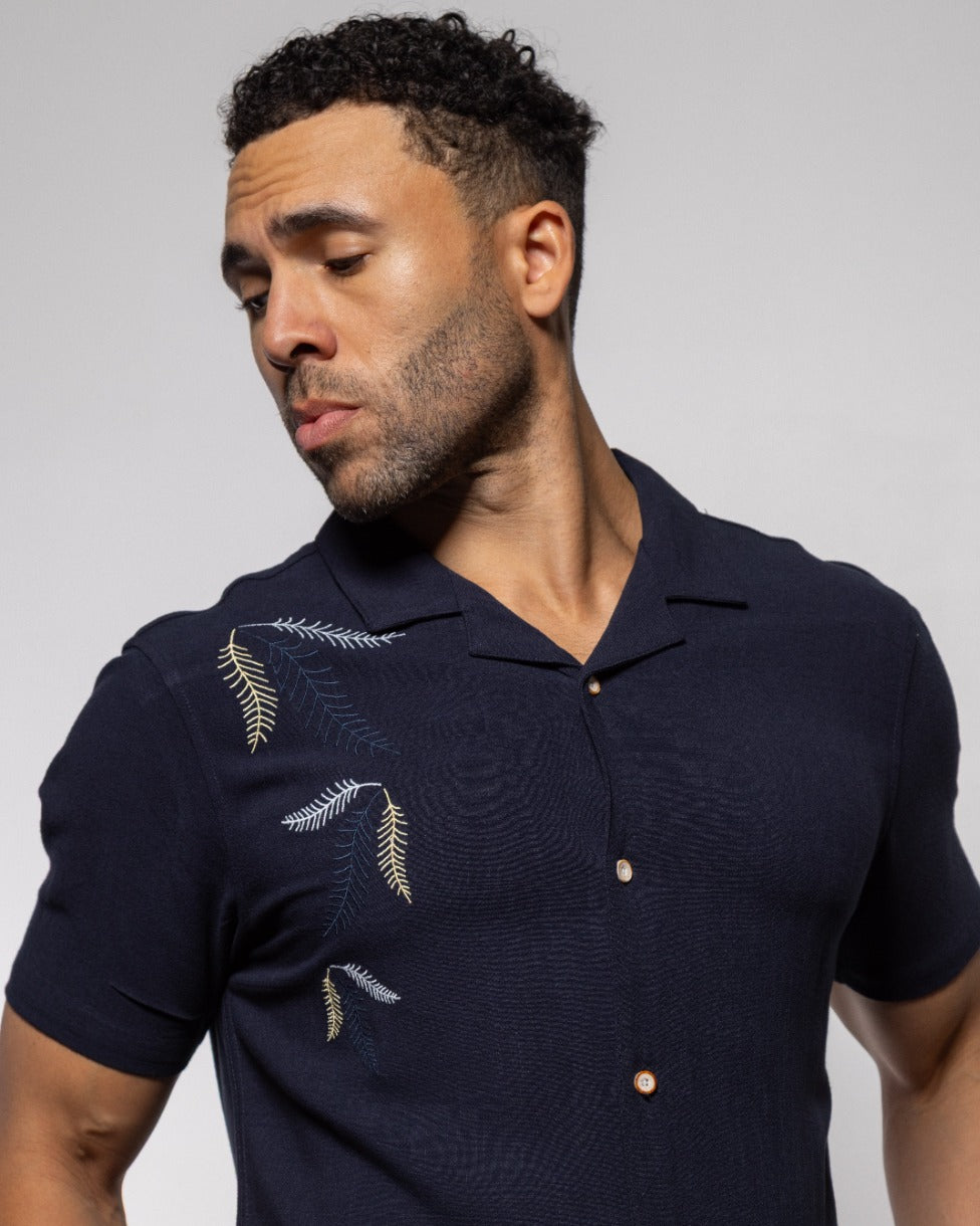 Indigo camp shirt with short sleeves, pointed collar, button front, leaf embroidery