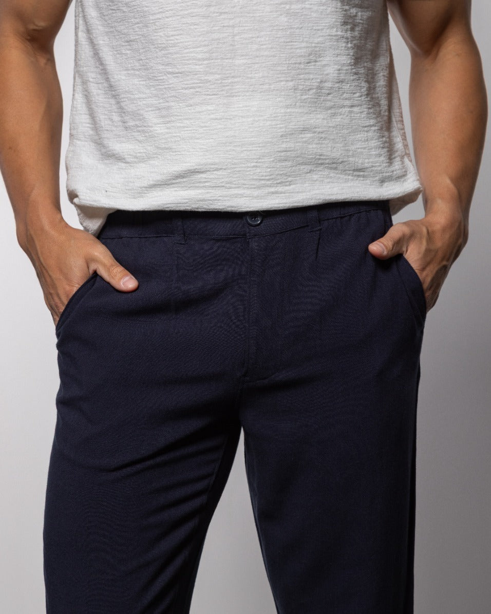 Indigo chino pants with button closure and front pockets