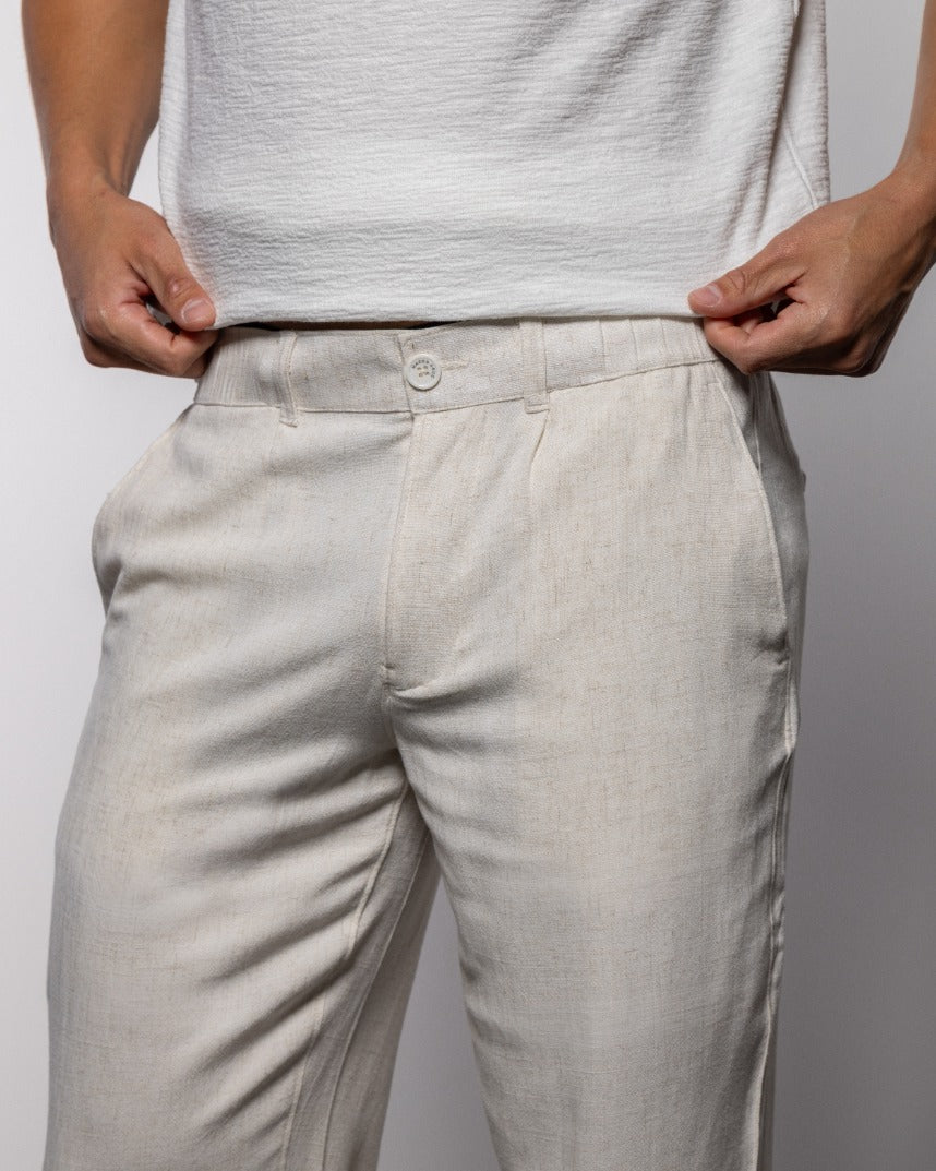 Men's light-beige chino pants with button closure and front pleats