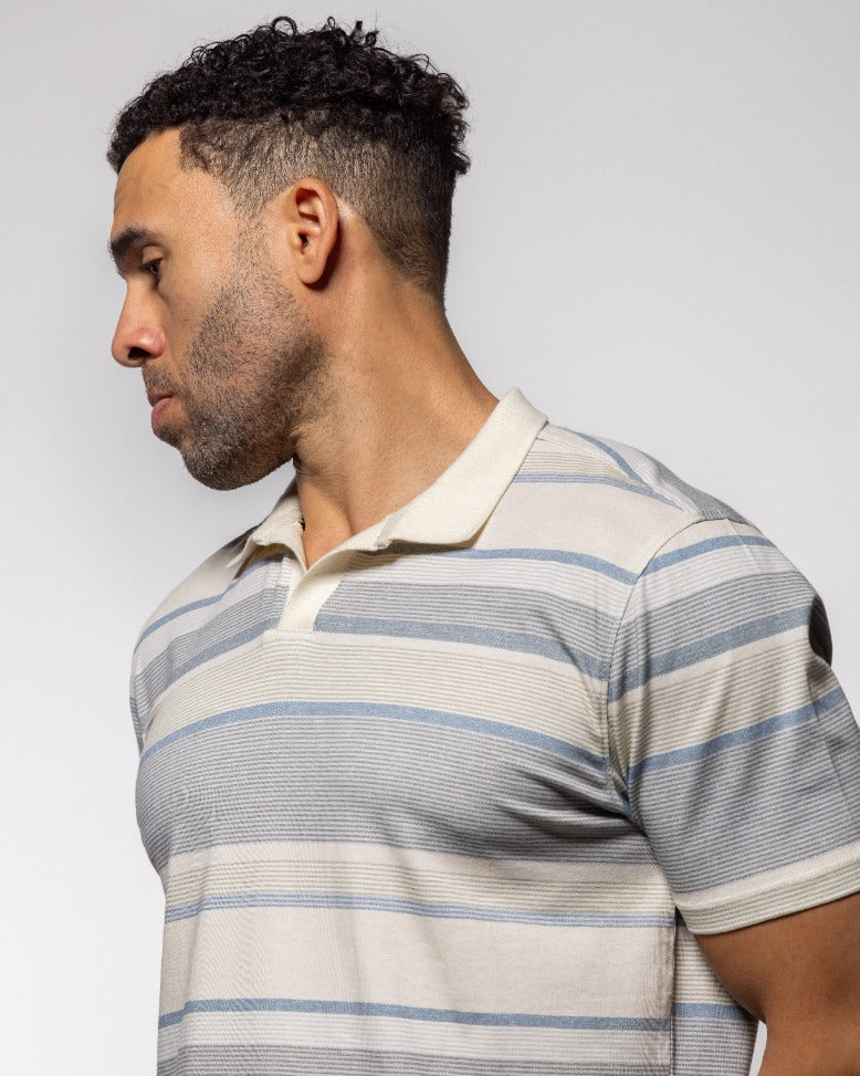 Daily Stripe Johnny polo shirt close-up, striped knit with cream collar and button placket
