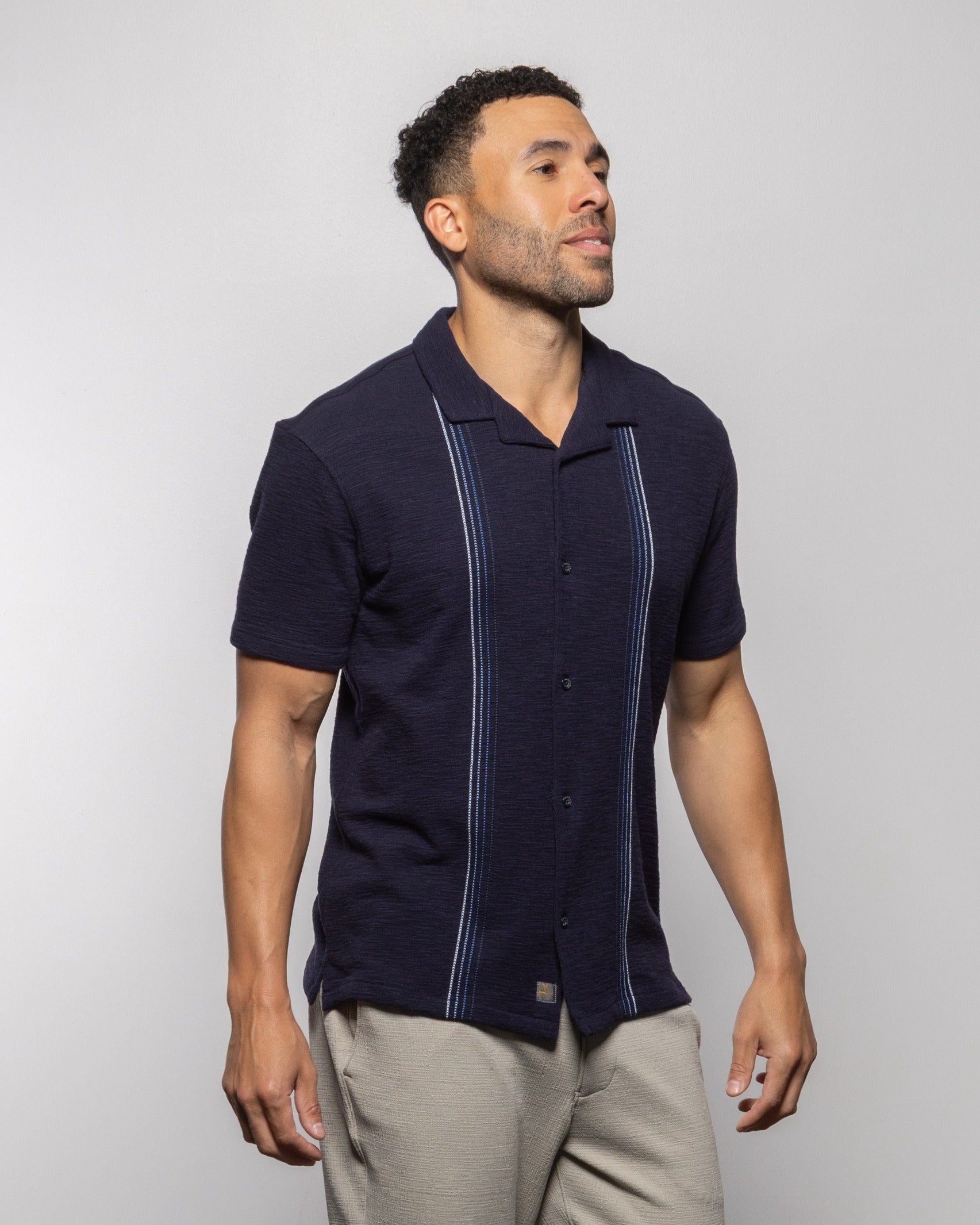 Men's camp shirt in dark indigo night with vertical striped panel and short sleeves