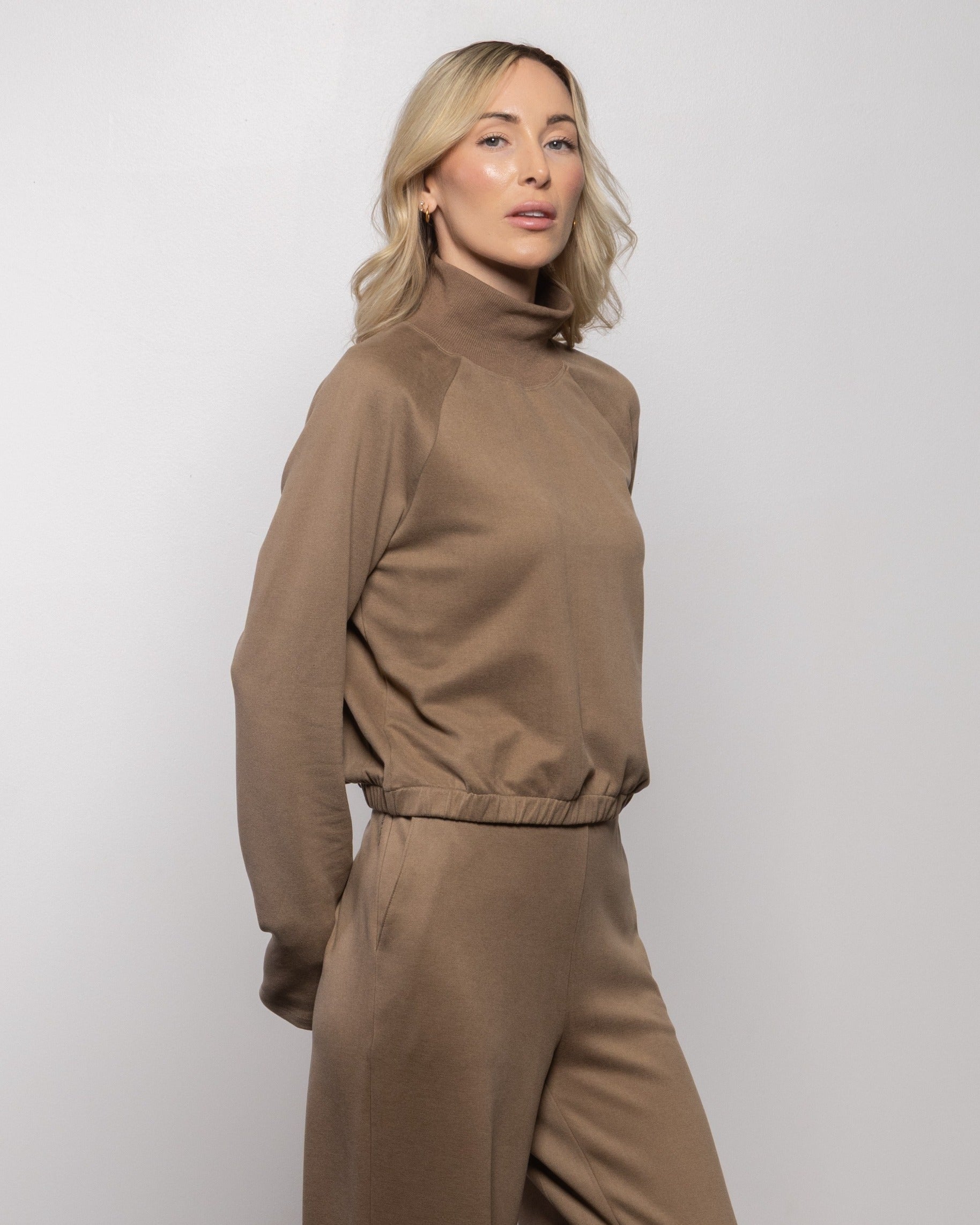 Wood-brown mock-neck lounge set with relaxed tapered pants, long sleeves