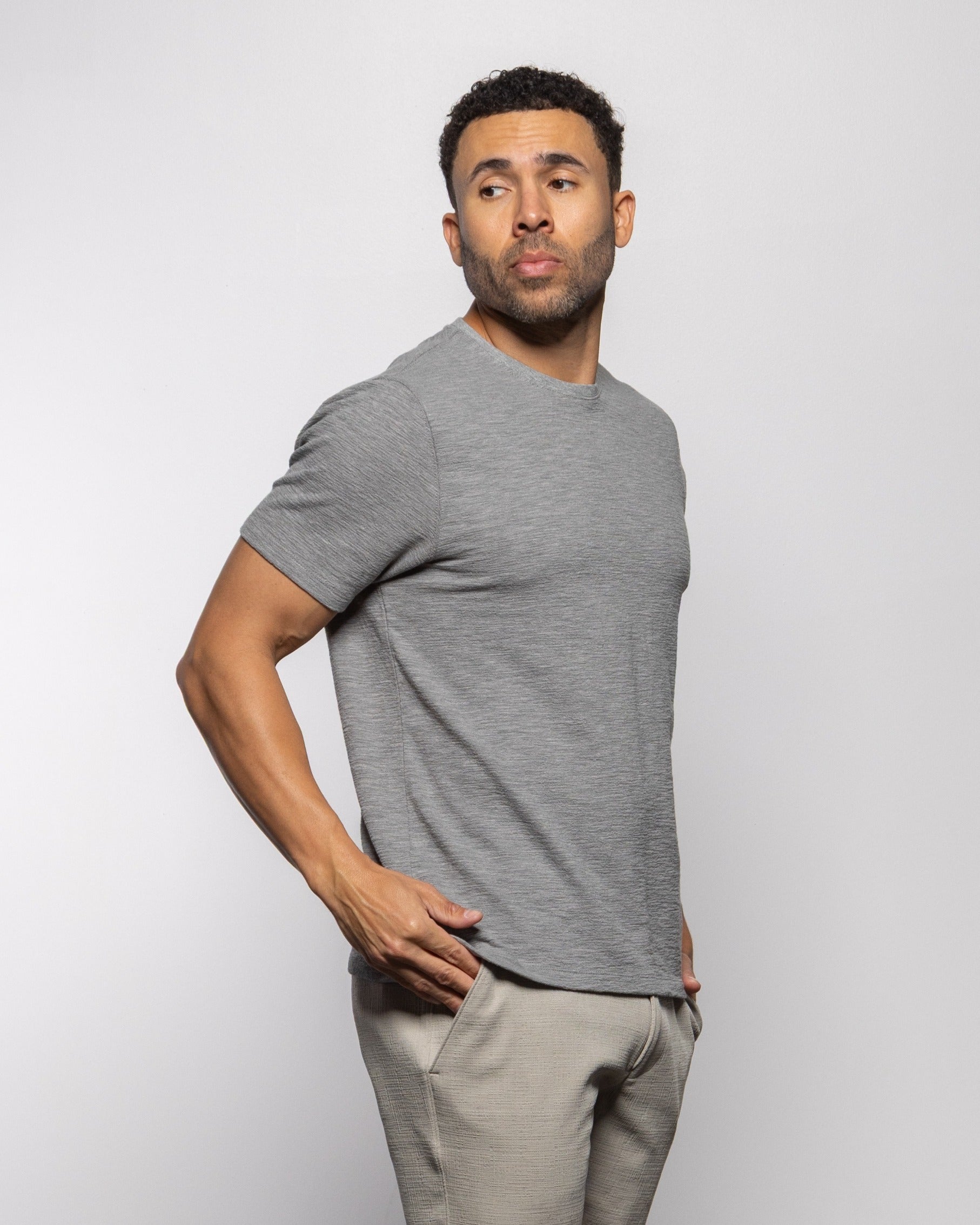 Men's T-shirt, concrete gray heather knit, crew neck and short sleeves, side view