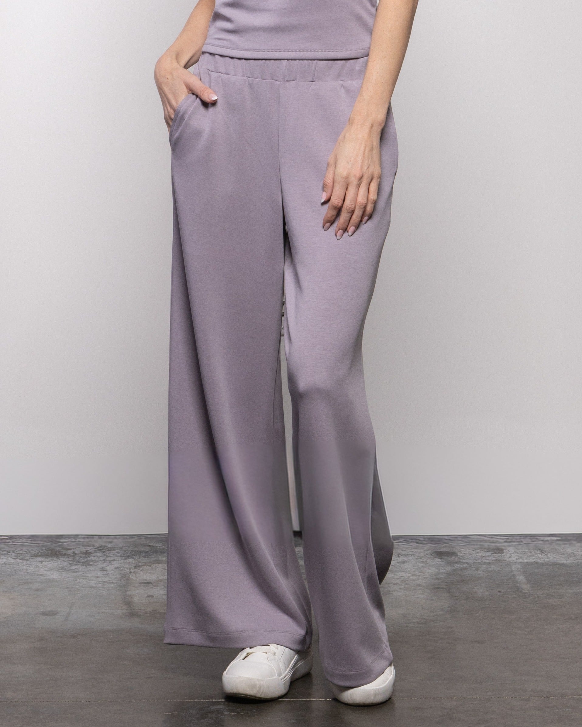 Lavender wide-leg trousers with gathered elastic waist and smooth drape