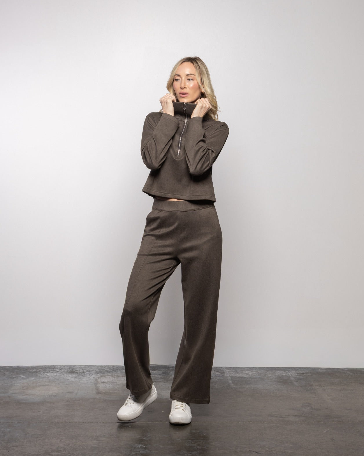 Dark wide-leg pants, full-length with relaxed straight leg and elastic waistband