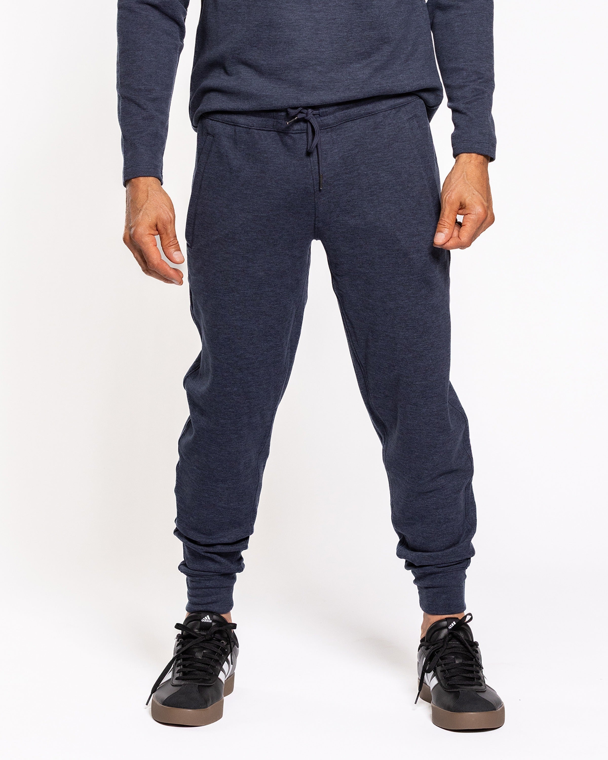 Navy jogger pants with elastic cuffs and front drawstring