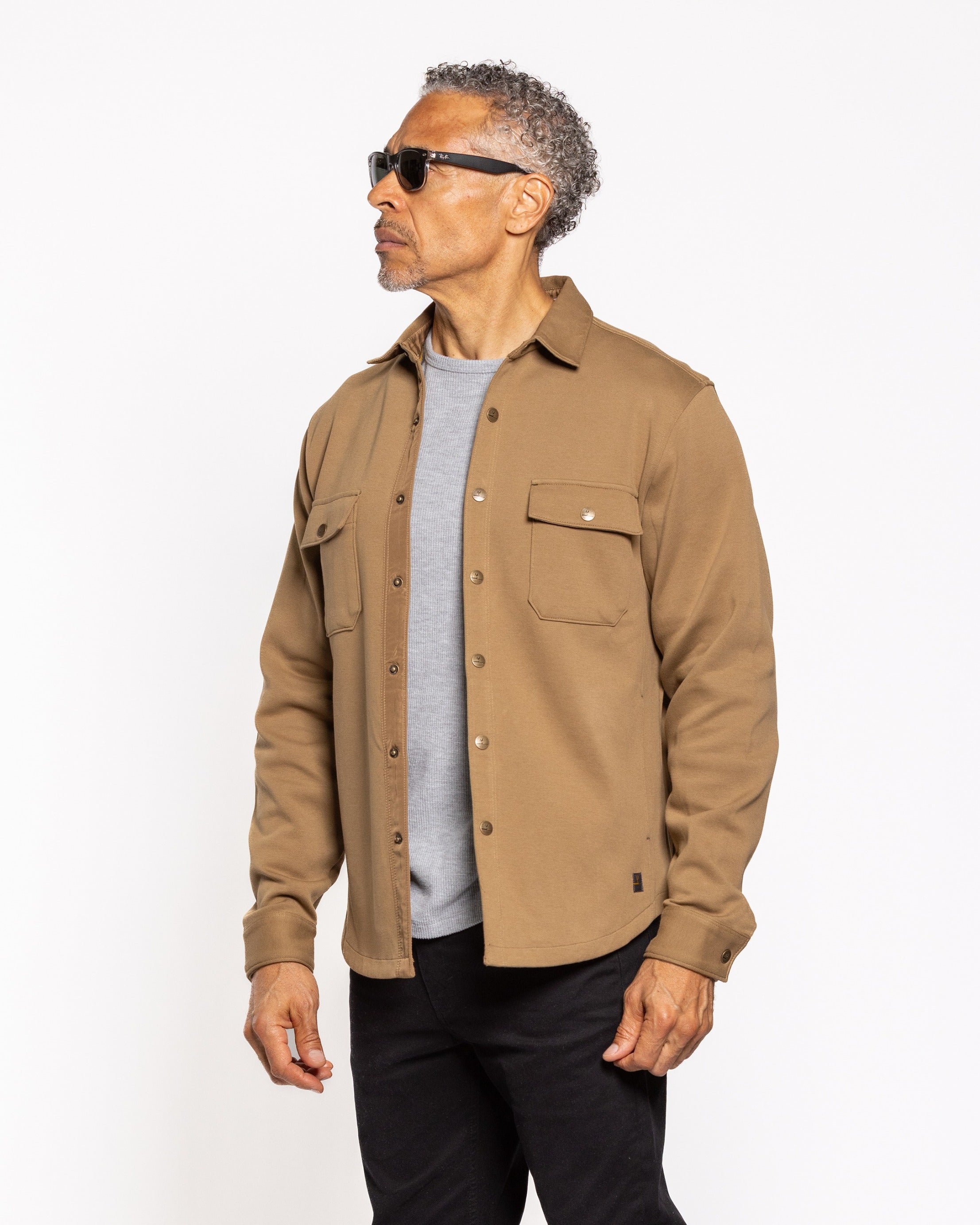 Griffin shirt jacket in tan with button front, stand collar, chest flap pockets