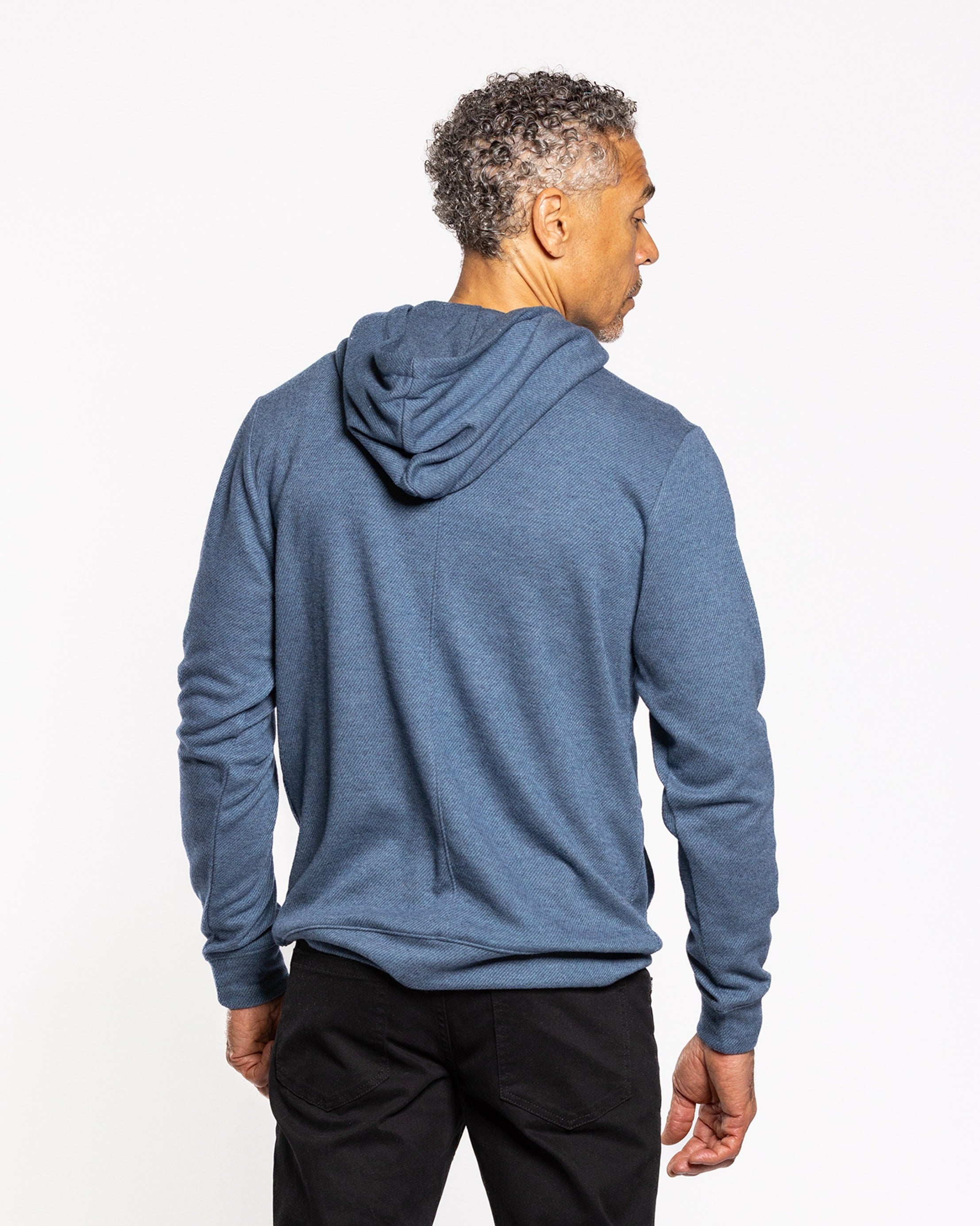 Indigo twill hood sweatshirt, back view with drawstring hood and pouch pocket