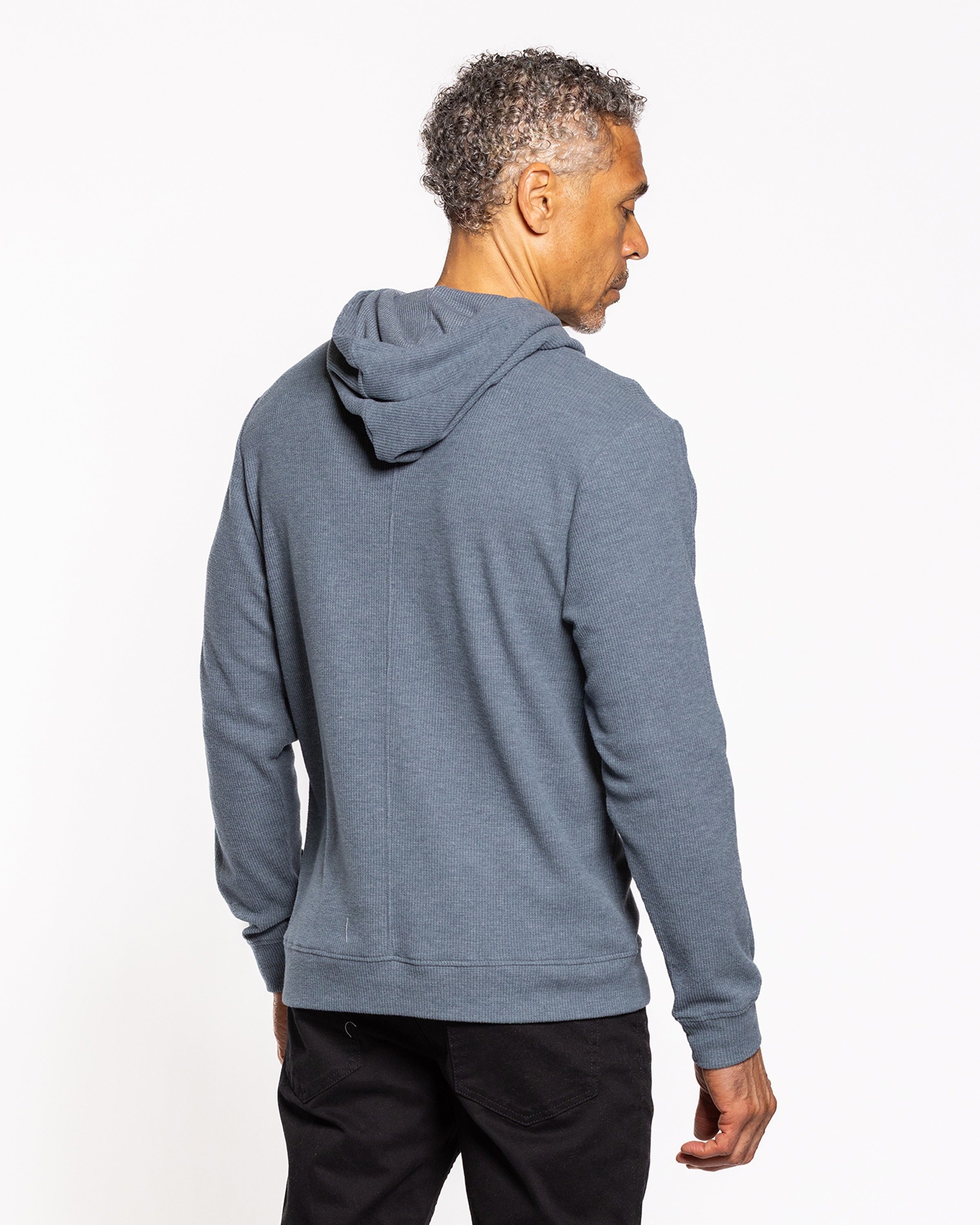 Dark slate hooded sweatshirt with kangaroo pocket, long sleeves, ribbed cuffs and hem