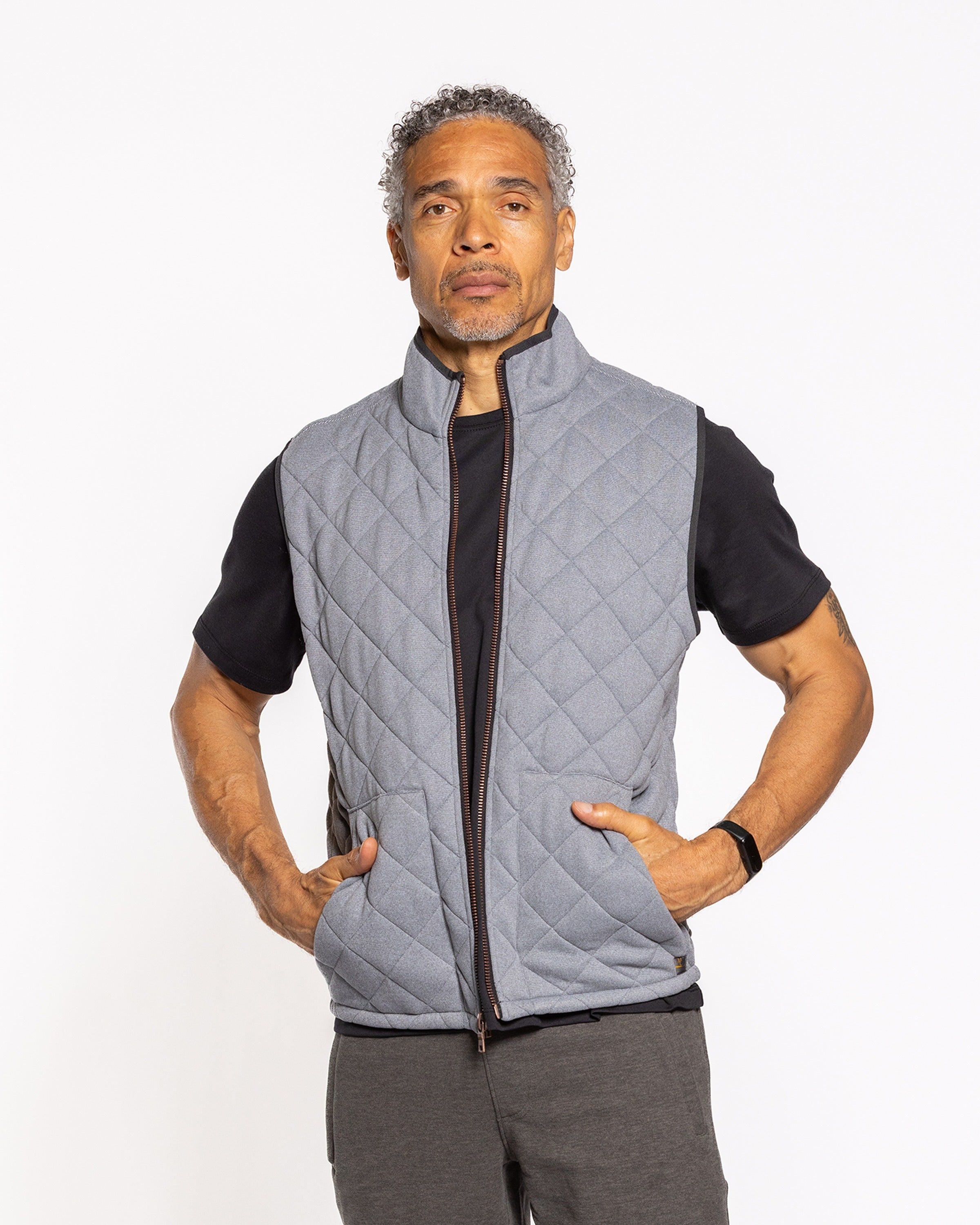 Quilted sleeveless vest with full front zipper and stand collar