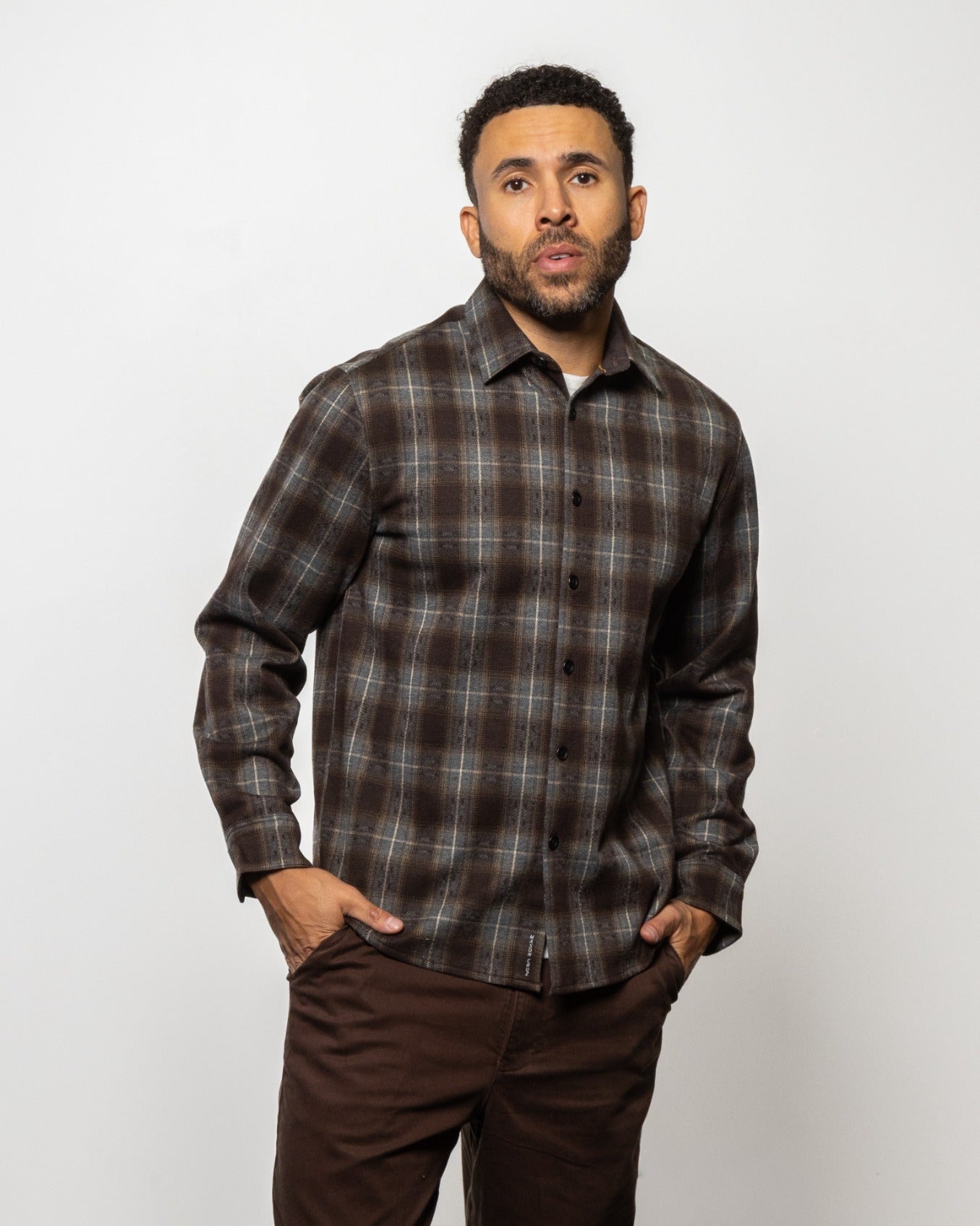 Men's plaid flannel button-up shirt, dark brown with gray grid, front view