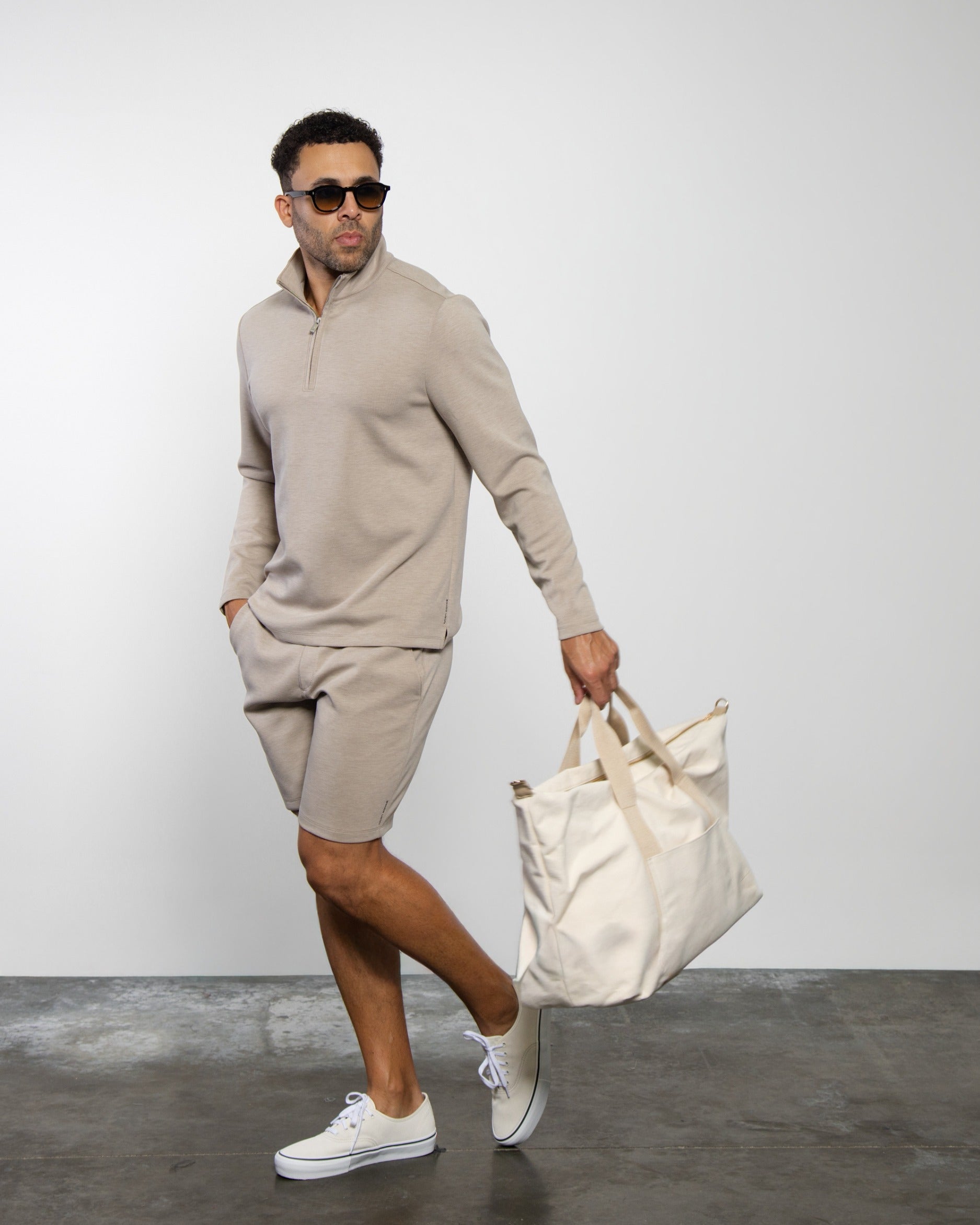 Men's taupe quarter-zip sweatshirt and matching shorts set, side view